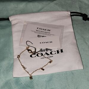 Coach Gold-Tone Delicate Charm Bracelet